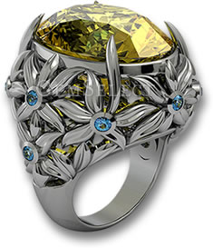 Серебряное кольцо из апатита с голубыми топазами