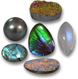 Переливающиеся драгоценные камни: радужный пирит, лунный камень, дублет опала, лабрадорит, жемчуг и аммолит.