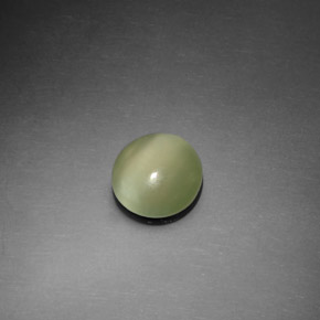 Натуральный зелёный actinolite cat's eye 1,10 карата огранка круг, прозрачный
