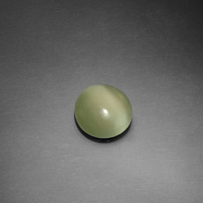 Натуральный зелёный actinolite cat's eye 1,10 карата огранка круг, прозрачный