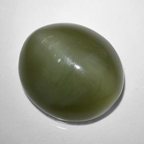 Натуральный зелёный actinolite cat's eye 9,44 карата огранка овал, полупрозрачный