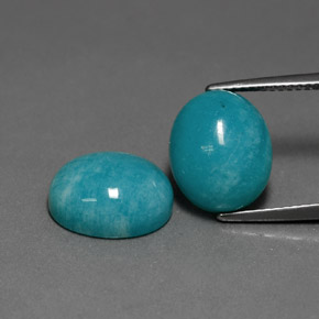Натуральный сине-зеленый амазонит  карата огранка овал, непрозрачный