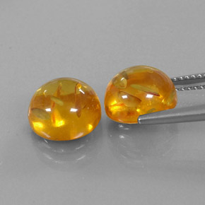Натуральный оранжевый янтарь  карата прозрачный, полупрозрачный
