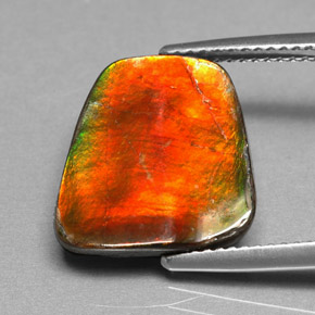 Натуральный многоцветный аммолит 5,17 карата необычная форма, непрозрачный
