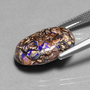 8.36 карата, натуральный Многоцветный Валунный опал, Огранка Овал, Непрозрачный