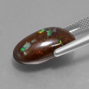 9.75 карата, натуральный Многоцветный Валунный опал, Огранка Овал, Непрозрачный