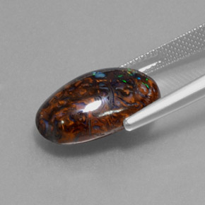 9.69 карата, натуральный Многоцветный Валунный опал, Огранка Овал, Непрозрачный