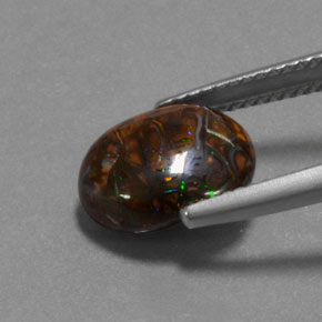 4.95 карата, натуральный Многоцветный Валунный опал, Огранка Овал, Непрозрачный