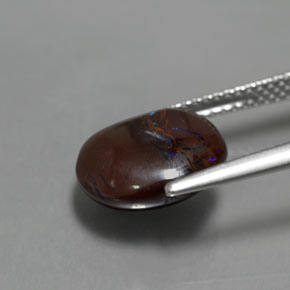 4.97 карата, натуральный Многоцветный Валунный опал, Огранка Овал, Непрозрачный