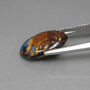 3.78 карата, натуральный Многоцветный Валунный опал, Огранка Овал, Непрозрачный