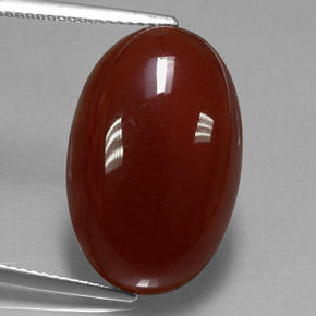 Натуральный оранжевый сердолик 14,62 карата огранка овал, полупрозрачный