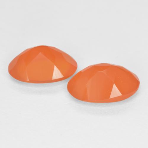 Натуральный теплый абрикосовый апельсин сердолик 1,12 карата огранка овал, полупрозрачный