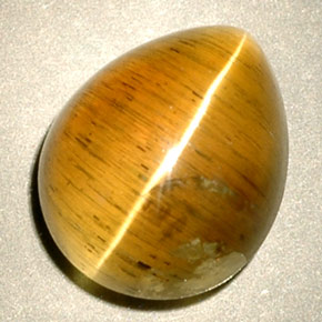 Натуральный жёлтый cat's eye apatite 4,94 карата прозрачный, полупрозрачный