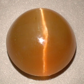 Натуральный жёлтый cat's eye apatite 3,62 карата прозрачный, полупрозрачный