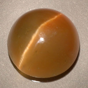 Натуральный жёлтый cat's eye apatite 3,62 карата прозрачный, полупрозрачный