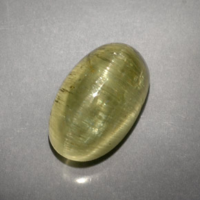 Натуральный зелёный cat's eye apatite 5,71 карата прозрачный, полупрозрачный