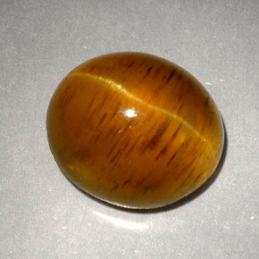 Натуральный жёлтый cat's eye apatite 5,05 карата прозрачный, полупрозрачный