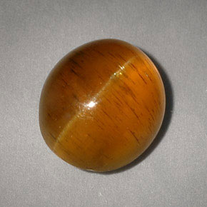 Натуральный жёлтый cat's eye apatite 5,05 карата прозрачный, полупрозрачный