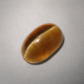 Натуральный жёлтый cat's eye apatite 4,93 карата прозрачный, полупрозрачный