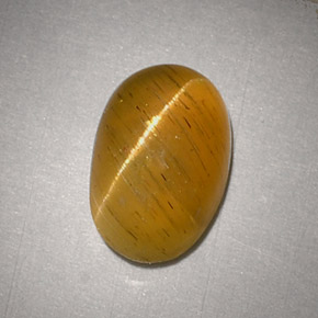 Натуральный жёлтый cat's eye apatite 2,48 карата огранка овал, полупрозрачный