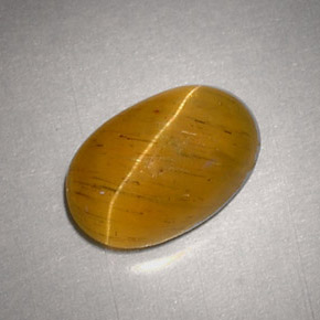 Натуральный жёлтый cat's eye apatite 2,48 карата огранка овал, полупрозрачный