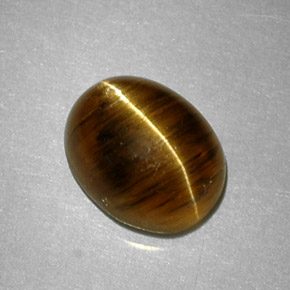 Натуральный жёлтый cat's eye apatite 2,64 карата огранка овал, полупрозрачный