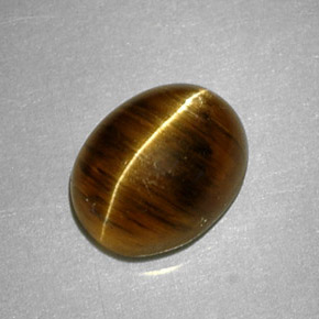 Натуральный жёлтый cat's eye apatite 2,64 карата огранка овал, полупрозрачный
