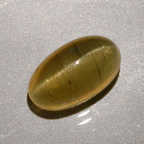 1.96 карата, натуральный зеленовато-золотистый Апатит Кошачий Глаз, Огранка Овал, Полупрозрачный