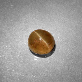 Натуральный жёлтый cat's eye apatite 1,61 карата огранка овал, полупрозрачный
