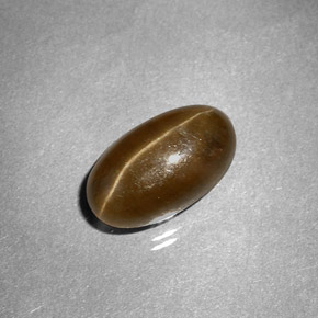 Натуральный жёлтый cat's eye apatite 3,58 карата огранка овал, полупрозрачный