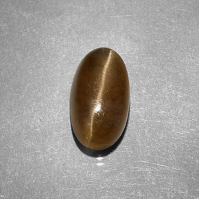 Натуральный жёлтый cat's eye apatite 3,58 карата огранка овал, полупрозрачный
