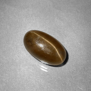 Натуральный жёлтый cat's eye apatite 3,58 карата огранка овал, полупрозрачный