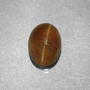 2.32 карата, натуральный Медовый Апатит Кошачий Глаз, Огранка Овал, Полупрозрачный