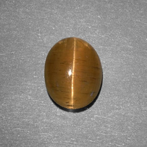 Натуральный жёлтый cat's eye apatite 2,05 карата огранка овал, полупрозрачный
