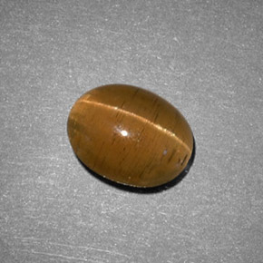 Натуральный жёлтый cat's eye apatite 2,05 карата огранка овал, полупрозрачный
