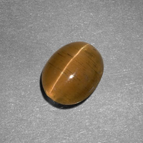 Натуральный жёлтый cat's eye apatite 2,05 карата огранка овал, полупрозрачный