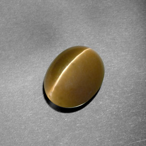 Натуральный зелёный cat's eye apatite 5,72 карата прозрачный, полупрозрачный