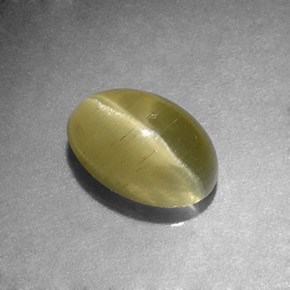 Натуральный зелёный cat's eye apatite 1,31 карата огранка овал, полупрозрачный