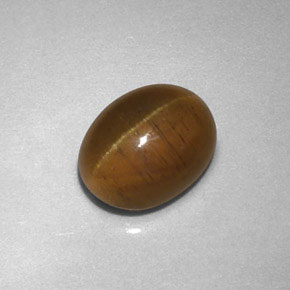 Натуральный жёлтый cat's eye apatite 2,85 карата прозрачный, полупрозрачный