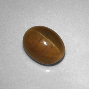 Натуральный жёлтый cat's eye apatite 2,85 карата прозрачный, полупрозрачный