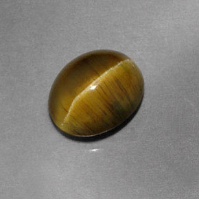 Натуральный зелёный cat's eye apatite 1,87 карата прозрачный, полупрозрачный