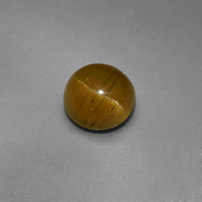 Натуральный зелёный cat's eye apatite 1,47 карата огранка круг, полупрозрачный