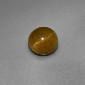 Натуральный зелёный cat's eye apatite 1,47 карата огранка круг, полупрозрачный