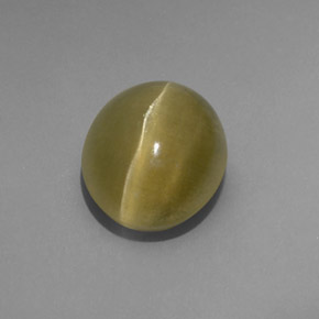 Натуральный зелёный cat's eye apatite 4,80 карата прозрачный, полупрозрачный