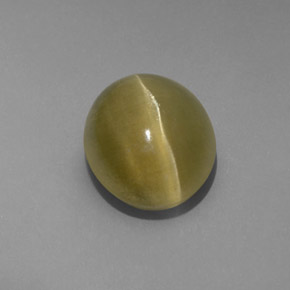 Натуральный зелёный cat's eye apatite 4,80 карата прозрачный, полупрозрачный