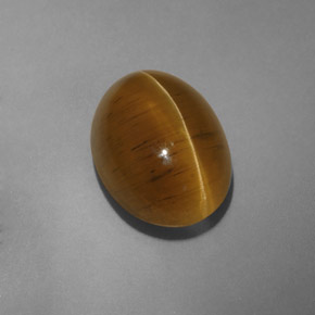 Натуральный жёлтый cat's eye apatite 9,54 карата прозрачный, полупрозрачный