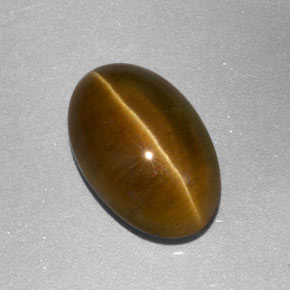Натуральный жёлтый cat's eye apatite 3,86 карата прозрачный, полупрозрачный