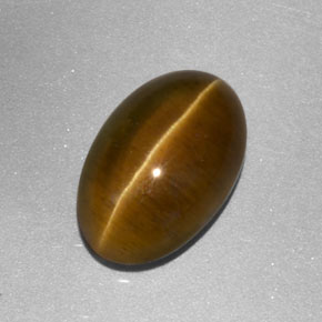 Натуральный жёлтый cat's eye apatite 3,86 карата прозрачный, полупрозрачный