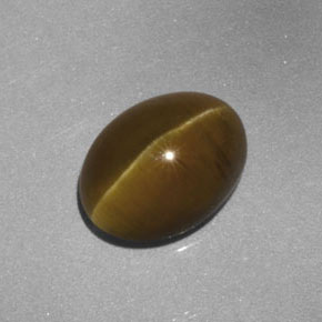 Натуральный жёлтый cat's eye apatite 3,52 карата прозрачный, полупрозрачный
