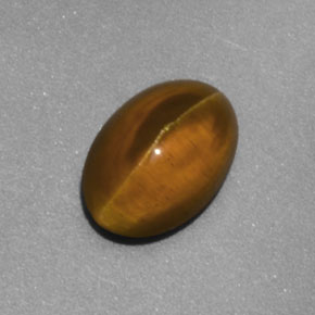 Натуральный жёлтый cat's eye apatite 2,02 карата прозрачный, полупрозрачный